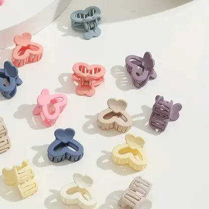 files/10-pcs-mini-matte-hollow-heart-hair-claw-clutcher-cute-strong-original-imah3rb8q4h8fhgu.webp
