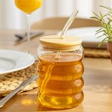 AM6279 Stylish High Borosilicate Glass Honey Jar with Wooden Dipper and Lid (550 ml) – 1 Pc