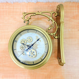 TM0017 Plastic Vintage Double-Sided Wall Clock with Exposed Gears and Ornate Gold Bracket