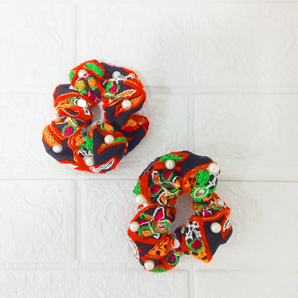Di0143 Navratri Hand-Embroidered Black and Orange Silk Hair Bun with Pearl Accents