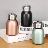 AM7802 COMPACT STAINLESS STEEL MINI BOTTLE WITH CARRYING RING FOR CONVENIENT ON THE GO HYDRATION