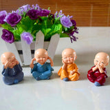 4781 4 Pcs Baby Buddha Monk Statue