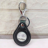 AM5252 Thiya Metal And Leather Keychain (Multi-Design) - Pack of 1 Pcs