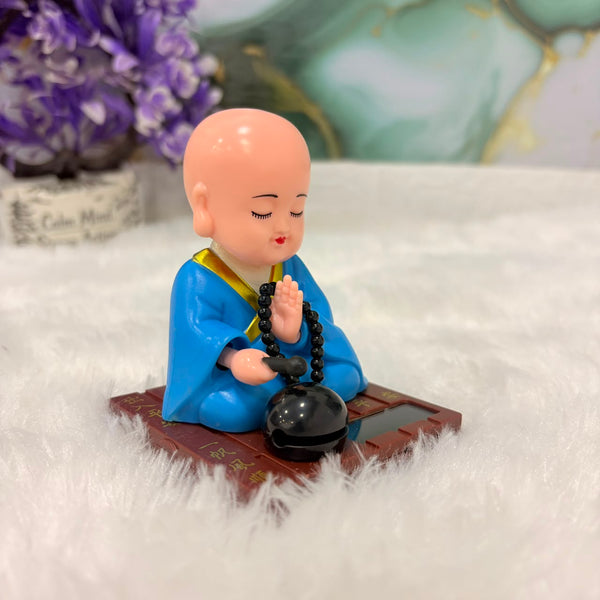 TM0194 Solar-Powered Moving Head Buddha Statue