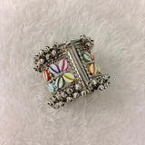 A06906 Oxidised Silver-Plated Multicolor Cowrie Shell & Ghungroo Broad Cuff Bangle
