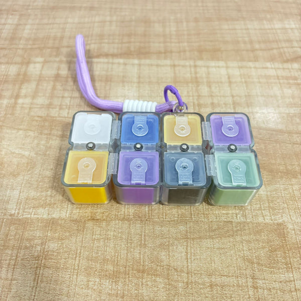 A07177 Portable Rubik's Cube Style Multi-Grid Pill Box with Lanyard