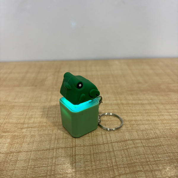 A07604 LED Light-Up Frog Croaking Keyboard Switch Fidget Toy Keychain