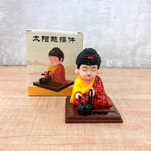 TM0194 Solar-Powered Moving Head Buddha Statue