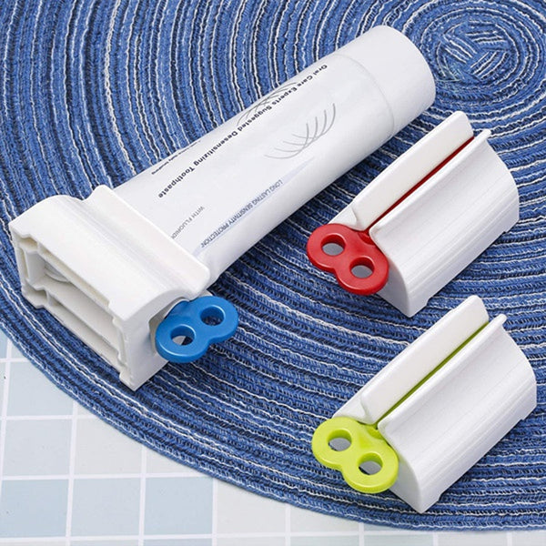 2514 Rolling Tube Toothpaste Squeezer Toothpaste Seat Holder Stand freeshipping - DeoDap