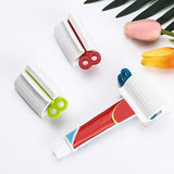 2514 Rolling Tube Toothpaste Squeezer Toothpaste Seat Holder Stand freeshipping - DeoDap